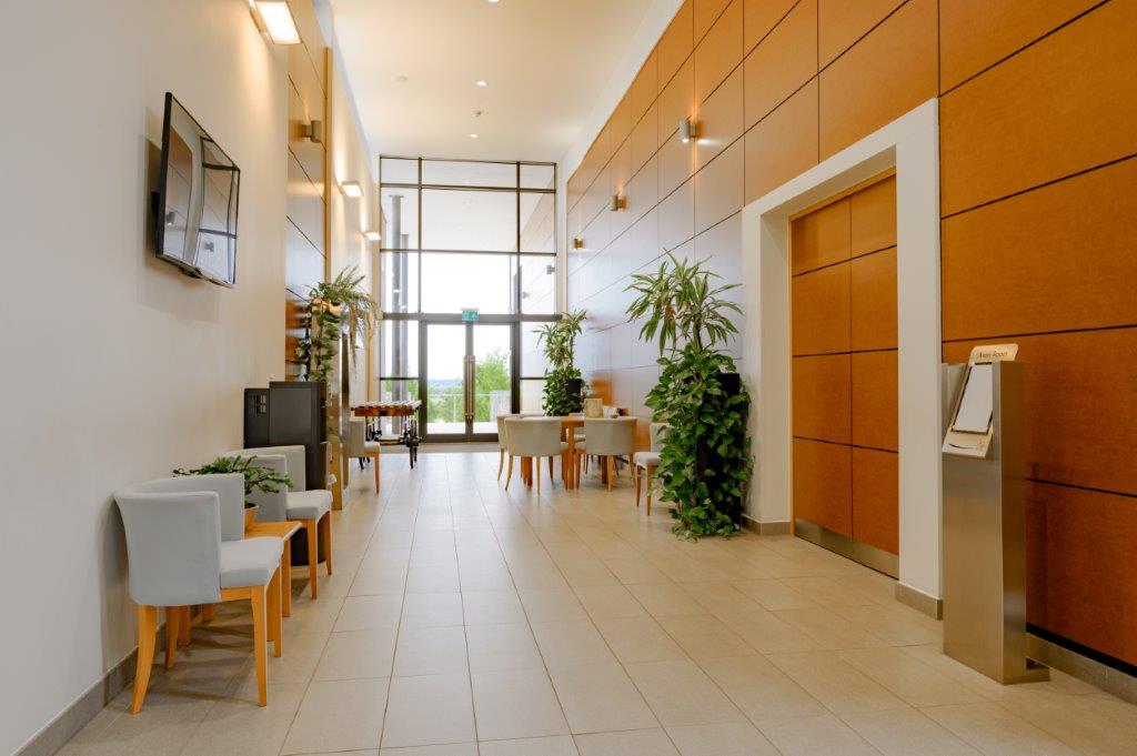 Image of the inside of the cemetery with chairs and book of remembrance