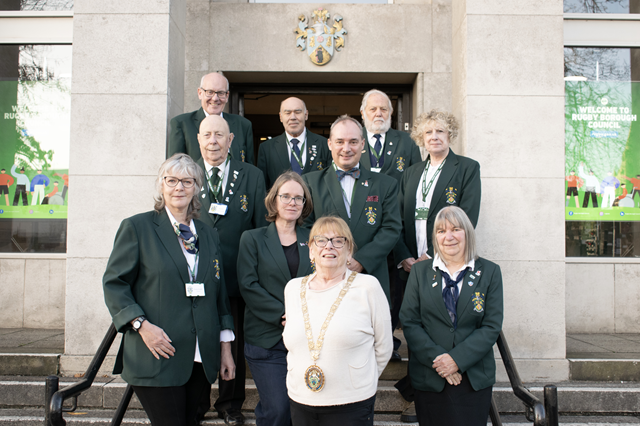 (back row, left to right) Dave Cheney, Geoff Buck, Ken Waugh, (middle row, left to right) Keith Ward, Richard Wilding, Rhona Miller, (front row, left to right) Victoria Saunders, Jenny Ball, the Mayor of Rugby, Cllr Barbara Brown, and Wendy Deaves.