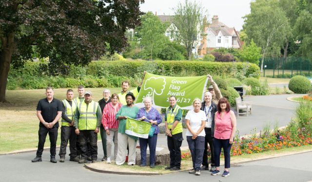 Cllr Maggie O'Rourke, Rugby Borough Council portfolio holder for partnerships, health and wellbeing, joined members of New Bilton Community Association and members of the council's parks team to celebrate the Green Flag success.